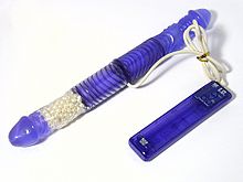 Double dildo with remote-controlled rotating vibrator on one side Double dildo overview 01.jpg