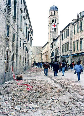 Civilians walking along Stradun Street during the siege