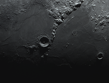 The lunar crater Eratosthenes (center left) as imaged from Earth by amateur astronomer Joel Frohlich using an 8-inch Schmidt-Cassegrain telescope. Eratosthenes crater seen with 8 inch Schmidt-Cassegrain.png