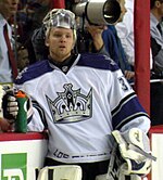 Former Los Angeles Kings players Kyle Calder and Rogie Vachon pose