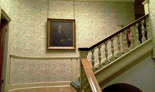 F. D. Maurice's portrait hanging on the college's staircase
