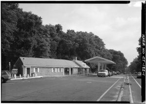 The production crew built a replica of a real rest stop along the Merritt Parkway in Greenwich, Connecticut, to film the proposal scene. GENERAL VIEW OF THE SOUTHBOUND SERVICE STATION AND SERVICE ISLAND. - Merritt Parkway, Greenwich (Southbound) Service Station, Abutting North side of Merritt Parkway, Greenwich, HAER CONN,1-GREWI,6-1.tif