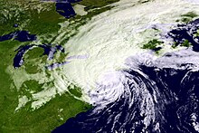 Gloria is shown as a large hurricane as it is making landfall in new England. The storm is in the process of losing its tropical characteristics; its eye has become obscured, and the vast majority of convection is located along the left half of the circulation.