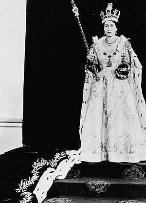 H.M. Queen Elizabeth II wearing her Coronation robes and regalia - S.M. la Reine Elizabeth II portant sa robe de couronnement et les insignes royaux.jpg