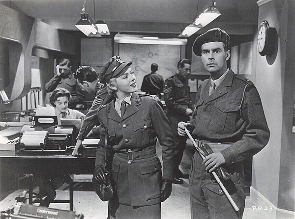 Carmichael and Jill Adams in Private's Progress (1956)