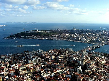 From left to right: The Sultan Ahmed Mosque; the Hagia Sophia; the Seraglio Point consisting of the Topkapı Palace and the Sea Walls; and the Galata Tower at far right, across the Golden Horn.