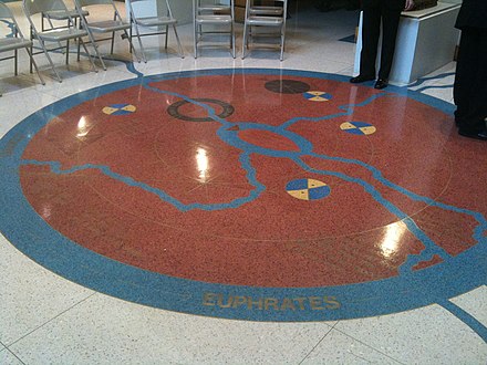Hughes's ashes are interred under a cosmogram medallion in the foyer of the Arthur Schomburg Center in Harlem