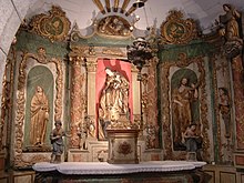 Retable baroque à la chapelle du château, qui ornait l'église Saint-Pierre, reconstruite après les guerres de religion et détruite en 1904.