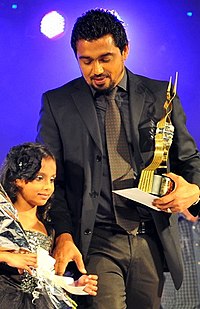 Mohamed at 2nd Maldives Film Awards ceremony with his daughter, 2012 Manik MFA2.jpg