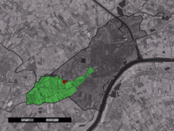 The village centre (red) and the statistical district (light green) of Wadenoijen in the municipality of Tiel.