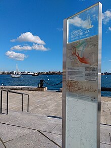A marker on the Long Wharf in Boston serves as a reminder of the active role of Boston in the slave trade, with details about the Middle Passage . MiddlePassageMarker.jpg