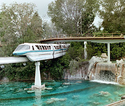 Mark V Monorail Blue travels over the former Submarine Voyage in 2002. MonorailOverLagoon wb.jpg