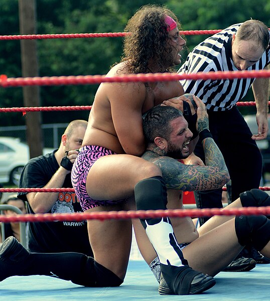 Matt Taven wrestles Vinny Marseglia at a 2015 outdoor event in Rhode Island