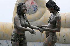 Mud wrestling in bikini at Boryeong Mud Festival, South Korea