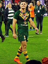 Nathan Cleary (pictured representing Australia) made a try-assist, kicked a 40/20, and scored the match-winning try in the final 23 minutes of the match. He was ultimately awarded a second Clive Churchill Medal for his performance. Nathan Cleary post match 2021 RLWC Final.jpg