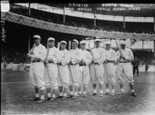 The NL champion New York Giants baseball team, 1913. Fred Merkle, sixth in line, had committed a baserunning gaffe in a crucial 1908 game that became famous as Merkle's Boner. New York Giants Opening Day line-up at the Polo Grounds New York. Left to right Fred Snodgrass, Tillie Shafer, George Burns, Larry Doyle, Red Murray, Fred Merkle, Buck Herzog, Chief Meyers (baseball) (LOC).jpg