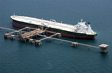 A commercial oil tanker receives oil at a terminal off Iraq. Oil tanker Abqaiq in 2003.jpg