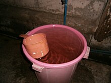 The timba (pail) and the tabo (dipper), the two essentials in Philippine bathrooms and bathing areas. P2040236C.JPG