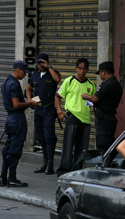 Guatemalan police checking documents