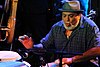 Poncho Sanchez performing at Jazz Cruise 2014.jpg