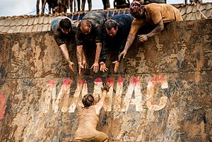 Rugged Maniac, Warped Wall Obstacle, 2014 RuggedManiacWallHelp.jpg