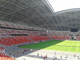 Сингапурдың Ұлттық стадионында отыру.jpg