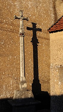 Shadow of astone cross in Burgundy, France