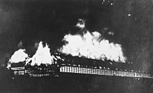 Distillery totally ablaze, 1936 StateLibQld 2 392621 Fire at Millaquin Distillery, Bundaberg, Queensland, 1936.jpg