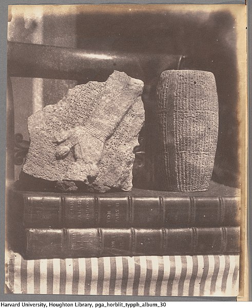 File:Still life with ancient Babylonian artifacts on books.jpg