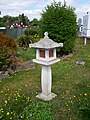 A stone lantern outside the 1920s Chinese Garage in Beckenham. [161]