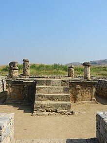 Platform of a Jain Stupa at Sirkap, near Taxila. Temple with columns visible - Sirkap.jpg