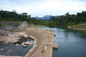 A river in Laos being interrupted by a hydropower dam