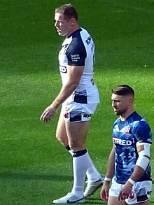 Burgess warming up for England in 2022 Thomas Burgess.jpg