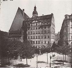 St. Thomas School in Leipzig (photo pre-1885). The Bach family apartment was on the right side, extended over four floors (three floors before the renovation in 1731/32), and was over 2200 square feet in size.[3] The building was pulled down in 1902. (The first Bach monument in the world can be seen in front of the St. Thomas School. It was initiated by Felix Mendelssohn Bartholdy who donated it to the city in 1843. It still survives today.) (Source: Wikimedia)