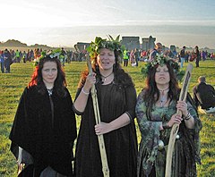 Three modern-day druidesses at Stonehenge on the summer solstice Three female druids.jpg