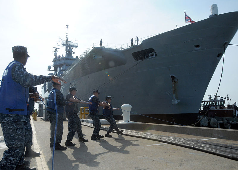 File:US Navy 100514-N-6764G-042 Line handlers secure mooring lines from the Royal Navy Invincible-class light aircraft carrier HMS Ark Royal (RO7) as it arrives at Naval Station Norfolk.jpg