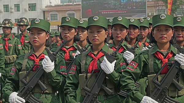 UWSA female soldiers stand at attention during ceremonies