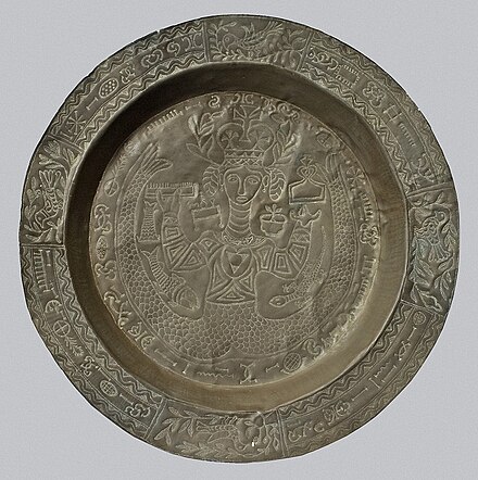 Usan Ndem (Ndem Plate) depicting an Efik deity