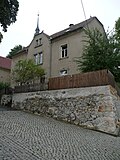 Apartment building in open development with retaining walls