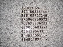 The value of pi is carved into the wall of the eastbound platform. However, only the first 11 decimal places are correct. It has been determined that the digits displayed are digits 1..10, 101..110, 201..210 etc. Wrong pi.jpg