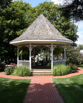 Gazebo at the site of the town's first railroad depot. Located in Lincoln Park. Zionsville, Indiana gazebo.png