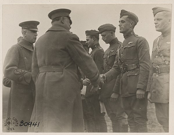 Lieutenant General Hunter Liggett awarding the Distinguished Service Cross to First Lieutenant Hugh Brewster of the 94th Aerial P. S. Squadron, Remico