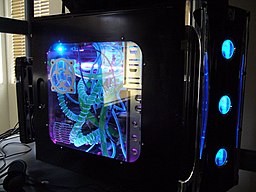 A common design in custom-built gaming PCs incorporates colorful lighting and a clear plastic or tempered glass side window. A Neon colored Computer.JPG