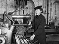 A member of the Women's Royal Naval Service (WRNS) working at a milling machine in the Royal Navy depot at Greenock, 22 March 1943. A15575.jpg