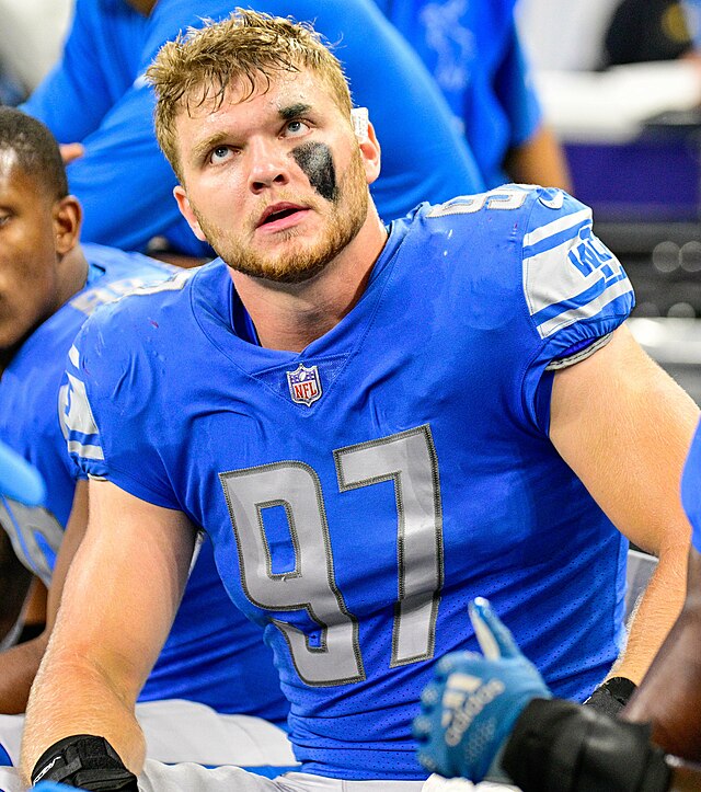 WATCH: Lions rookie Aidan Hutchinson picks off Aaron Rodgers in