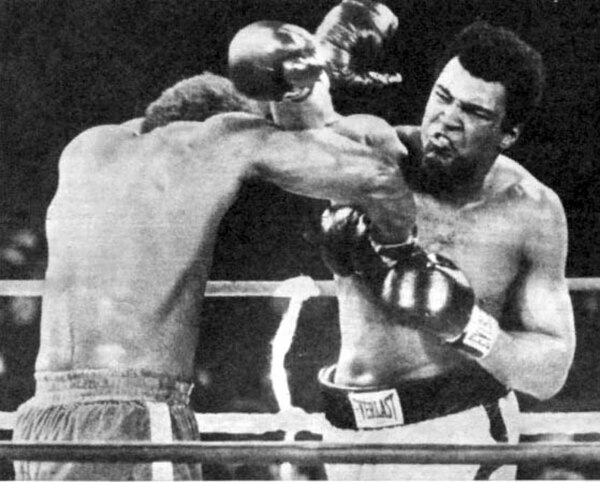 October 30, 1974: Muhammad Ali defeats George Foreman in "The Rumble in the Jungle" in Kinshasa, Zaire.