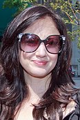 Andrea Riseborough, wearing sunglasses