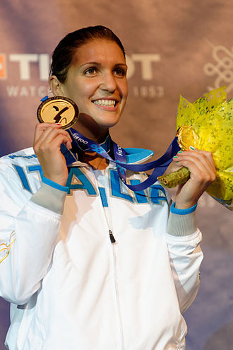 2013 World Champion Arianna Errigo Arianna Errigo podium 2013 Fencing WCH FFS-IN t204702.jpg