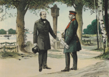 König Wilhelm I. (rechts) führt in Park Babelsberg bei Potsdam eine Unterredung mit Otto von Bismarck (links). Der Monarch hält in seiner linken Hand ein Regierungsprogramm, auf das er Bismarck verpflichten will. In Folge des Gespräches ernannte der König Bismarck zum preußischen Ministerpräsidenten. (Lithographie nach einer Zeichnung von Carl Röhling, Die Hohenzollern in Bild und Wort, Verlag von Martin Oldenbourg, Berlin 1899, S. 40) (Quelle: Wikimedia)