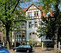 Tenement house with enclosure in open development